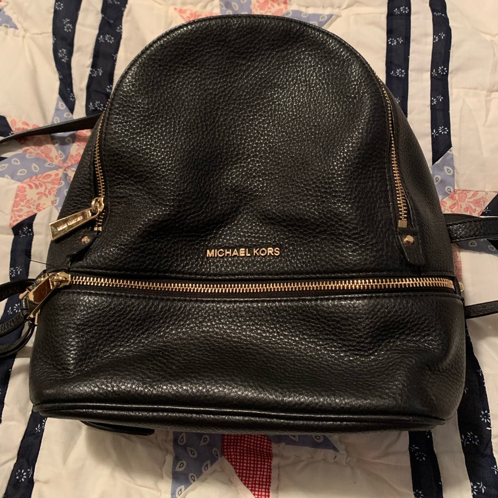Michael Kors LARGE black backpack purse.